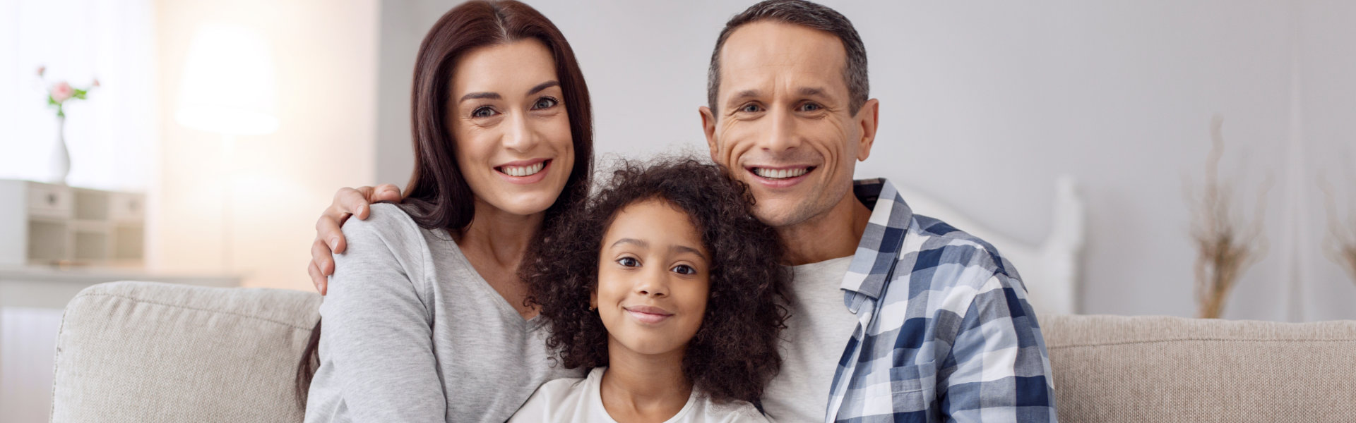 Family sitting together smiling